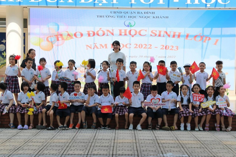 A group of people posing for a photo  Description automatically generated