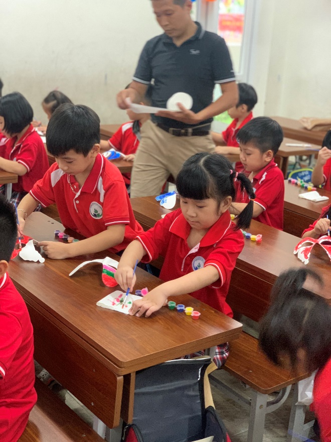 A picture containing person, child, indoor, floor
Description automatically generated