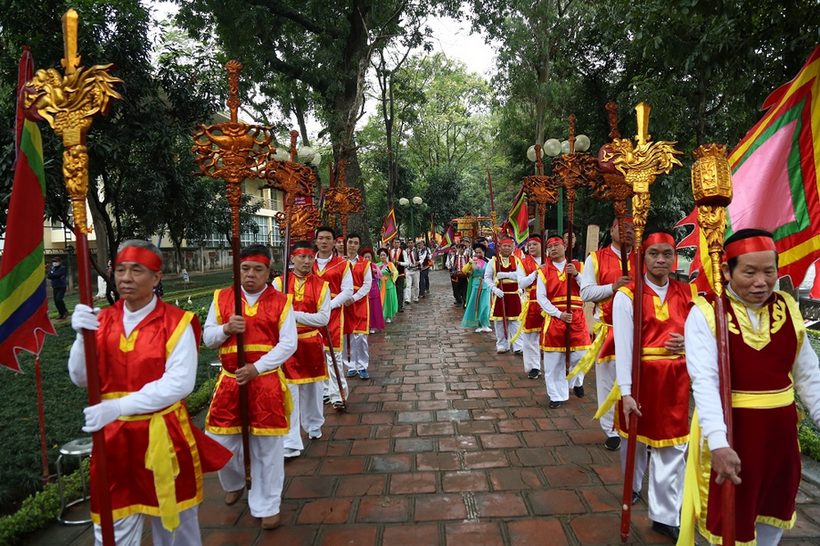 A picture containing tree, outdoor, dancer, person
Description automatically generated