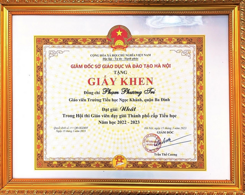 A picture containing text, picture frame  Description automatically generated