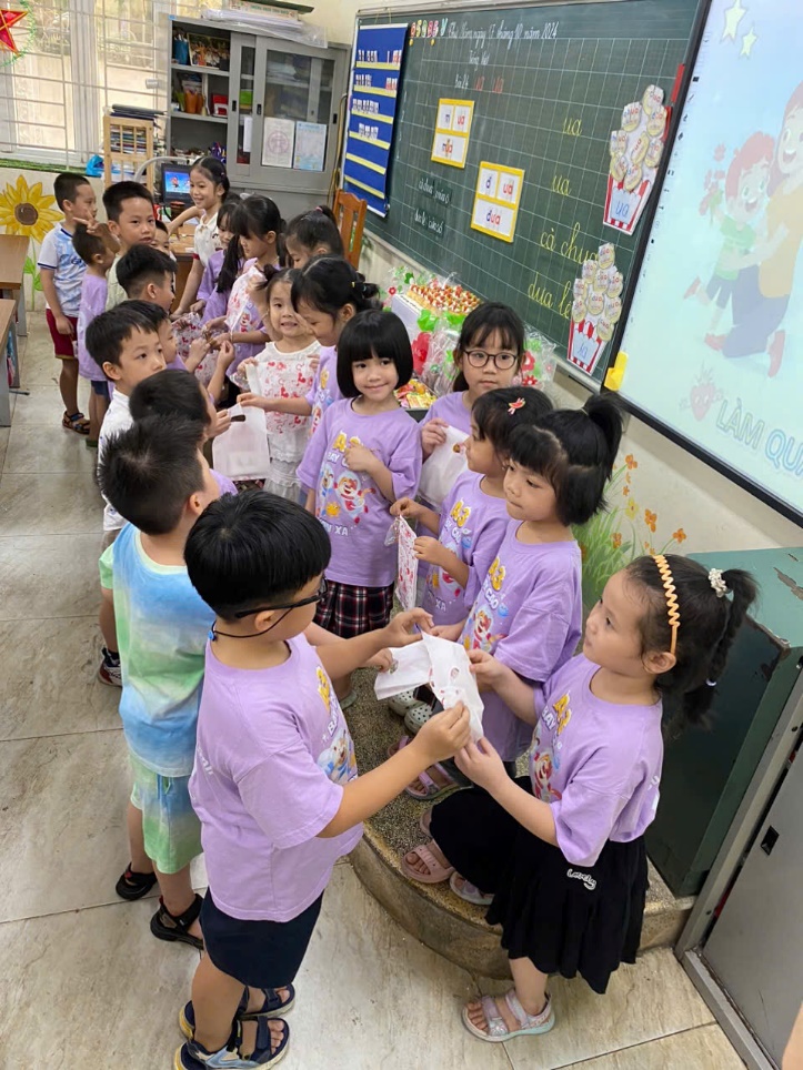 A group of children in a classroom
Description automatically generated