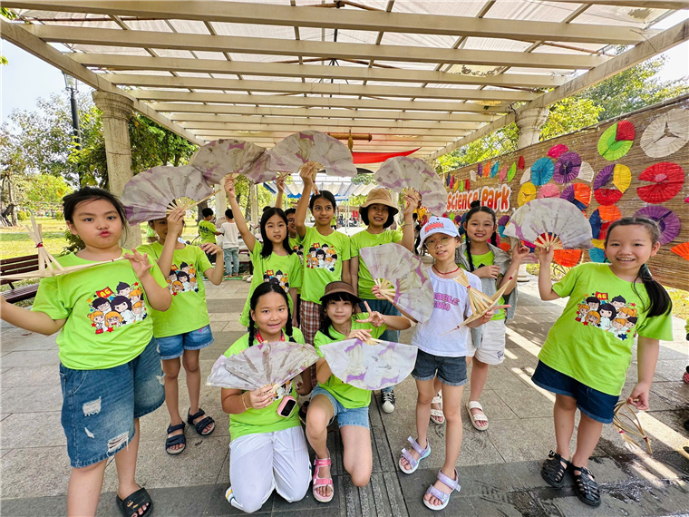 A group of children posing for a picture
Description automatically generated