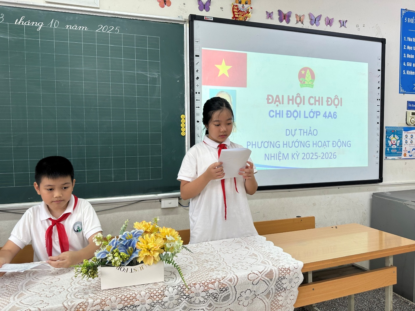 A child and child in front of a chalkboard

AI-generated content may be incorrect.