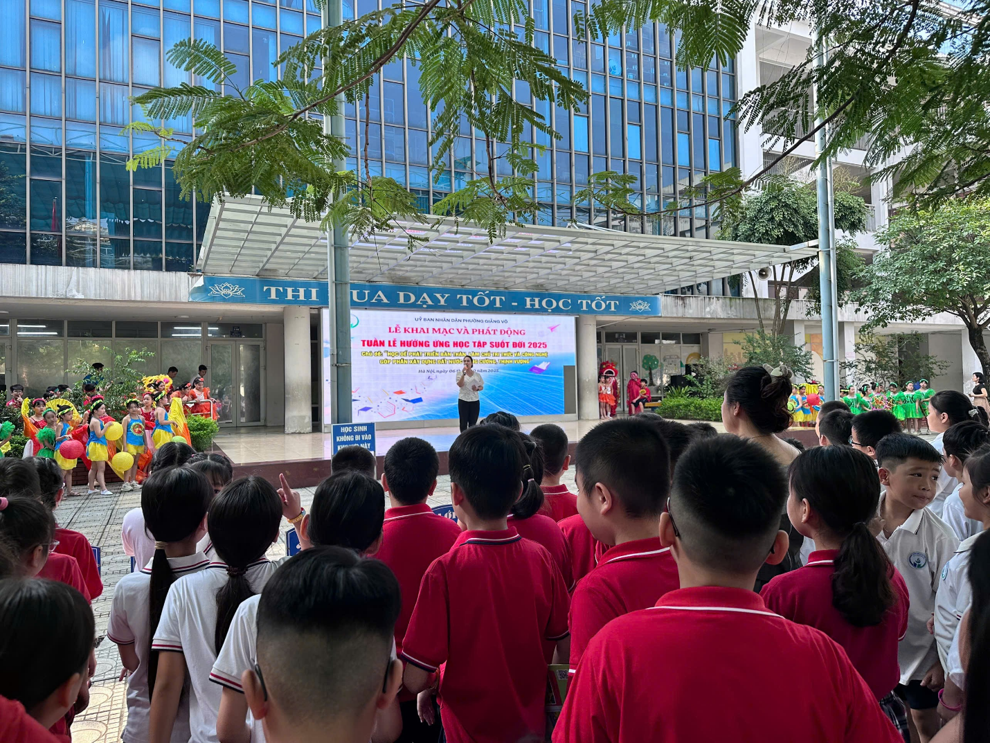 A group of children in red shirts
AI-generated content may be incorrect.