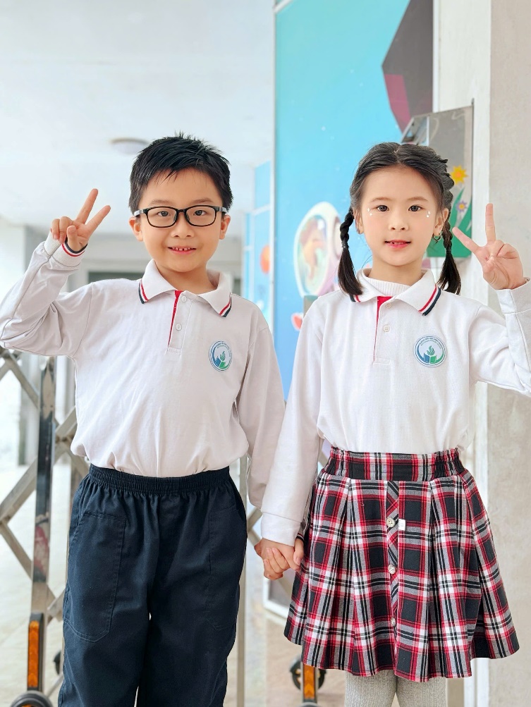 A child and child holding hands
AI-generated content may be incorrect.