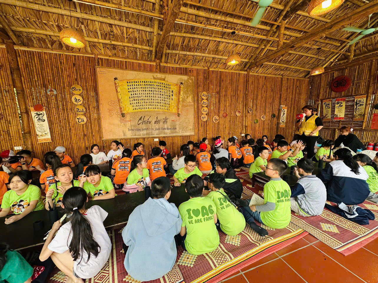 A group of people sitting on the floor

AI-generated content may be incorrect.